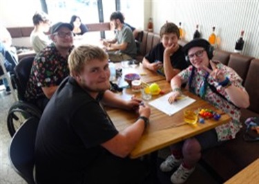 FCC Youth Services Group at table