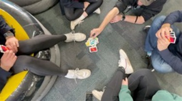 FCC Youth Services group playing card game